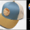 Buff Daddy Coin-Patch Baseball Cap.<br/><br/>Colors: Smoke Blue, Beige, Amber Gold.<br/>This cap features a laser-etched, faux-suede leather patch.<br/>Pacific Headwear® #104C, Trucker Snapback design. Adjustable.<br/><br/>